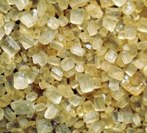 beautiful-closeup-shot-yellow-cane-sugar-macro-perfect-background
