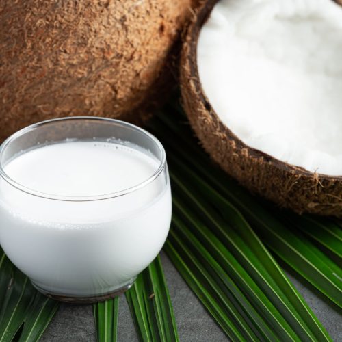 glass-coconut-milk-put-dark-background
