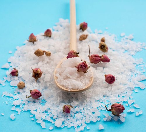minimalist-bath-salt-spa-concept-rose-buds
